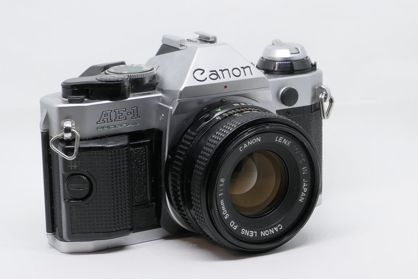 Canon AE-1 camera on a white background