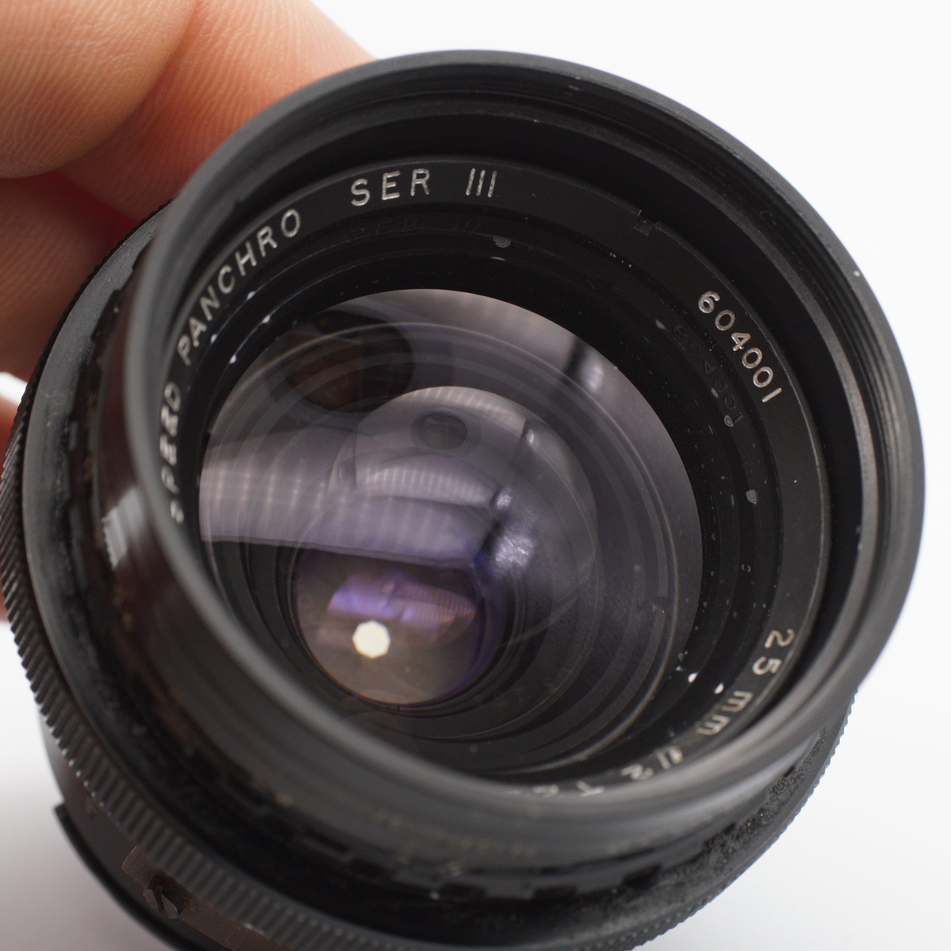 Cooke Speed Panchro 25mm f/2 (T2.2) Series III vintage lens by Taylor Hobson, iconic for its warm, cinematic look, displayed with a metal body and classic design, available at Retro Cameras Ireland