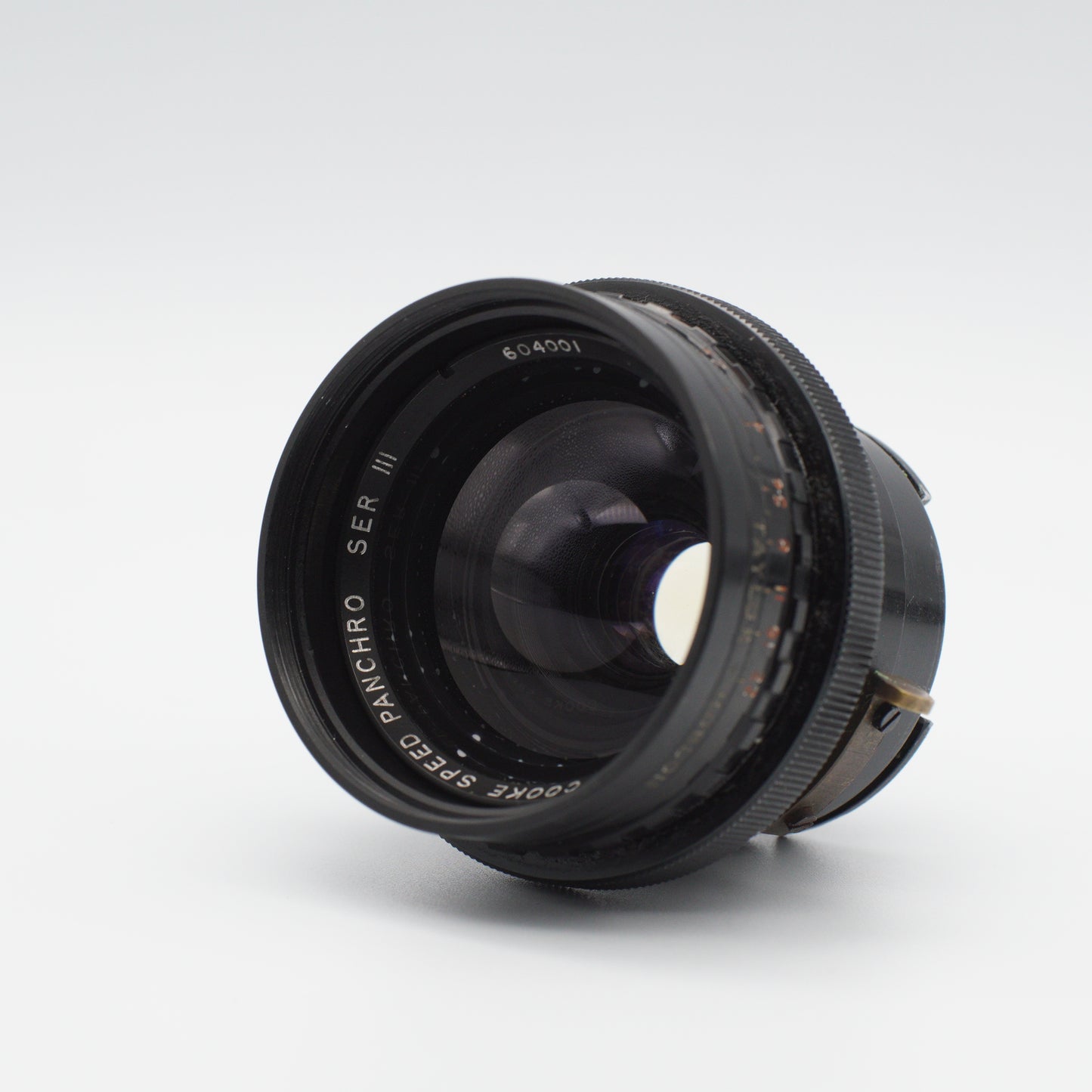 Cooke Speed Panchro 25mm f/2 (T2.2) Series III vintage lens by Taylor Hobson, iconic for its warm, cinematic look, displayed with a metal body and classic design, available at Retro Cameras Ireland