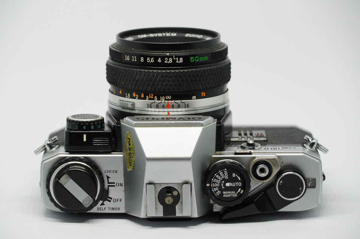 Olympus OM-10 35mm Film Camera with Zuiko 50mm f/1.8 + Manual Adapter
