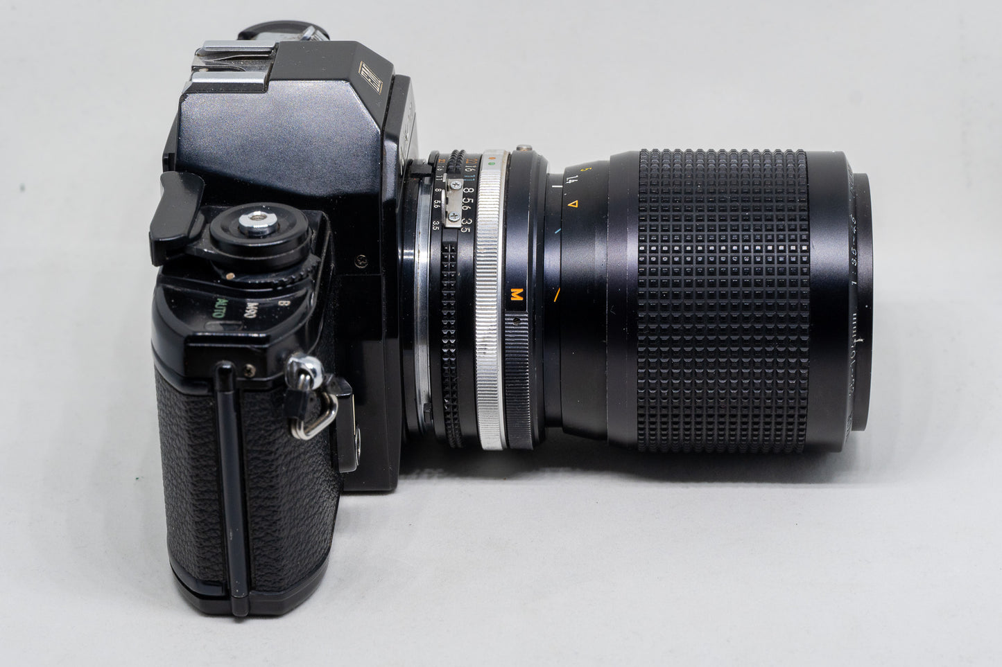 Nikon EM – 35mm SLR Film Camera with Nikon Zoom Lens